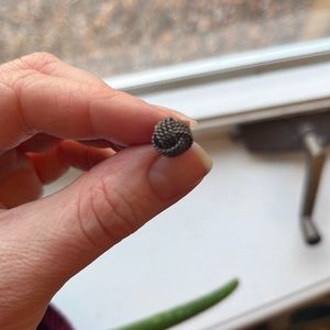 Single Tiffany & Co twisted knot earring